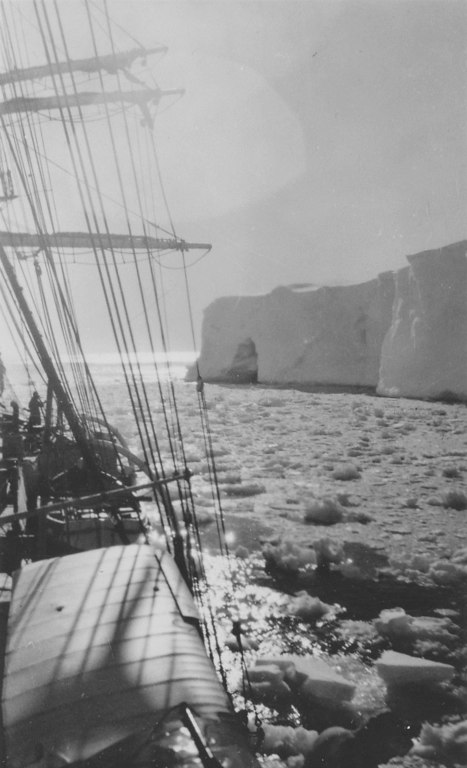 RRS Discovery in the pack near an iceberg, circa 1930 DUNIH 1.343