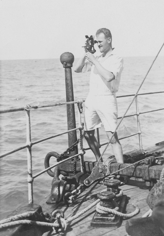 Crew member (possibly Simmers) using a sextant DUNIH 1.405