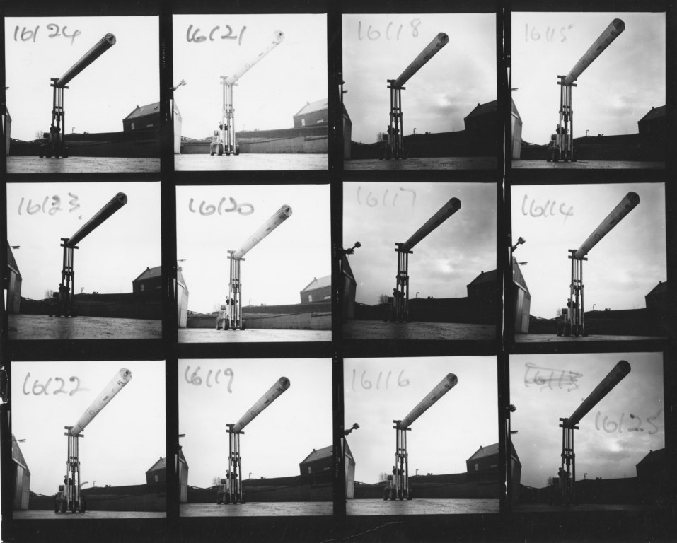 Contact sheet of a frock lift truck lifting a roll of fabric DUNIH 2008.106.19