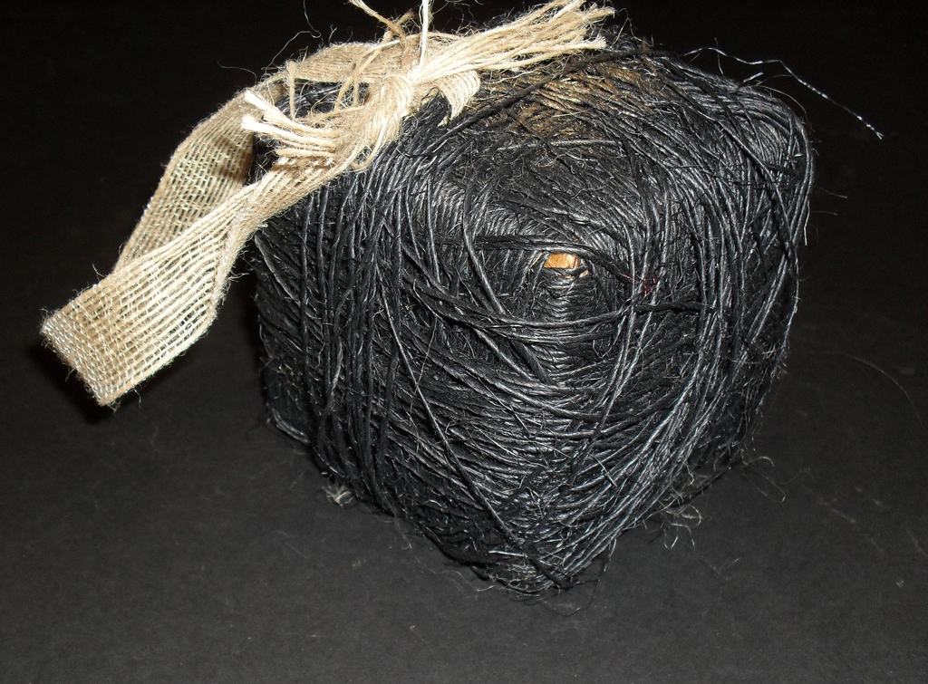 Cube covered in black jute twine DUNIH 2011.1.23