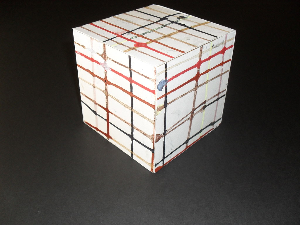 Cube with white, black,brown, red and yellow mesh DUNIH 2011.1.26