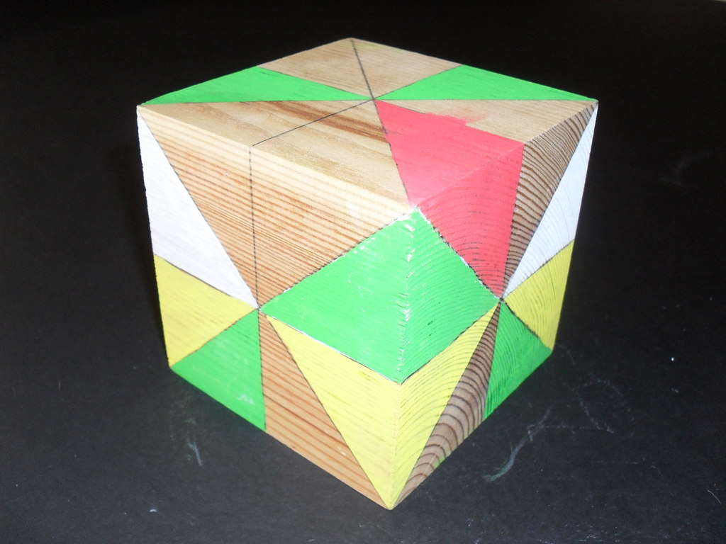 Cube with coloured triangles. DUNIH 2011.1.39
