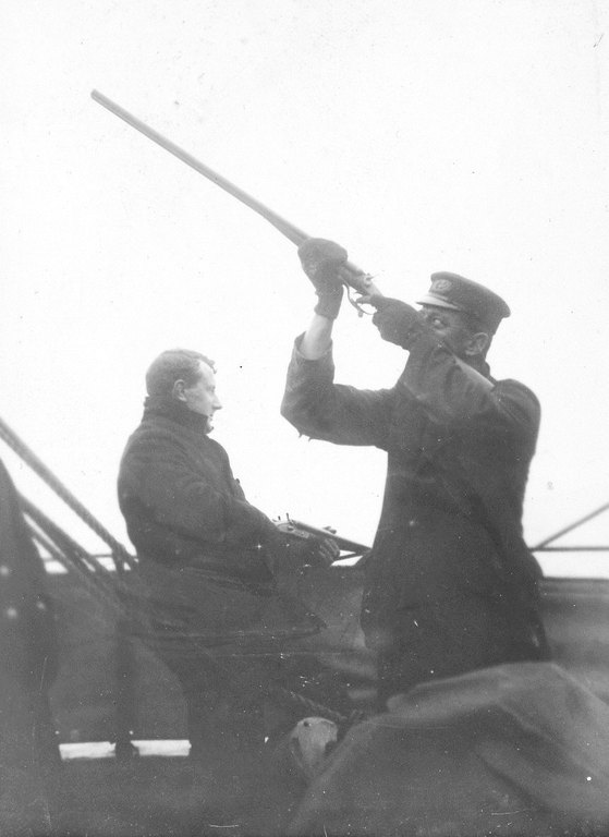 Dr. Edward Wilson & James H Dellbridge shooting from deck of "Discovery" K.19.57