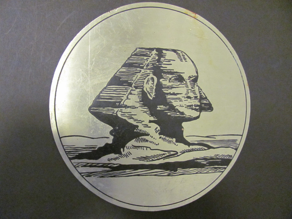 Sphinx metal plaque DUNIH 2008.49.4