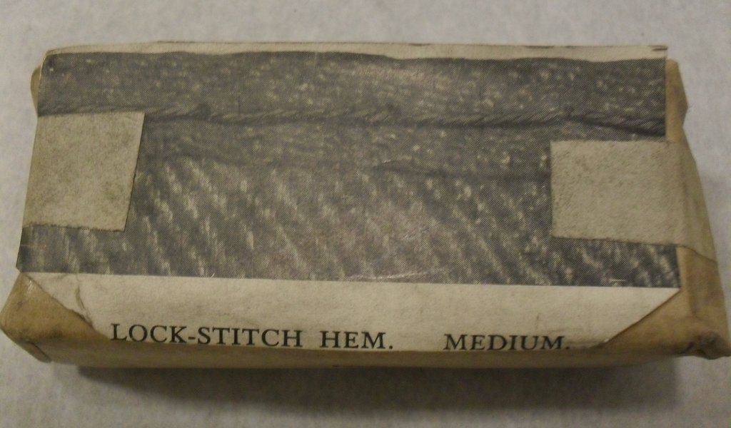 Wrapped printing block of lock stitch hem DUNIH 284.118