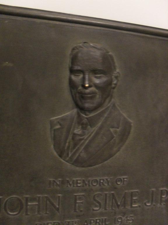Bronze plaque in memory of John F. Sime DUNIH 2014.6
