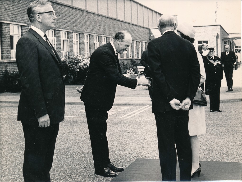 Photograph of the Queen being introduced to John Weir (Sidlaw Group Managing Director), May 1969 DUNIH 2017.16.2.4