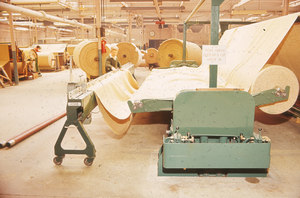 Image of Finished jute being cut and pressed. DUNIH 2006.1.75.37