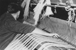 Image of Buist Factory- Tenter setting up loom DUNIH 2007.59.17