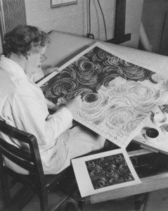 Image of Female designer working on a carpet design DUNIH 2008.104.17