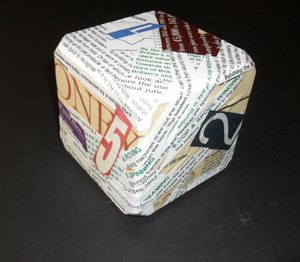 Image of Cube covered in text (2) DUNIH 2010.47.2