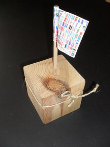 Image of Cube embellished with plaited jute string and flags DUNIH 2011.1.1