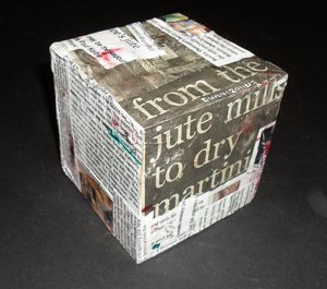 Image of Cube decoarted with jute industry publications DUNIH 2011.1.12