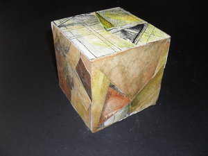 Image of Cube covered in scraps of fabric and paper (1) DUNIH 2011.1.14.1