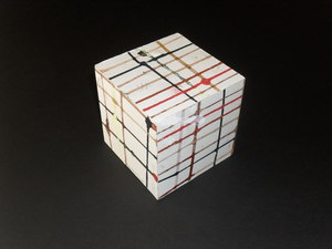 Image of Cube with white, black,brown, red and yellow mesh DUNIH 2011.1.26