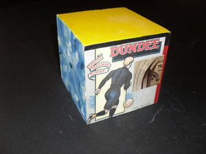 Image of Cube with footballer and Dens Park, Dundee. DUNIH 2011.1.36