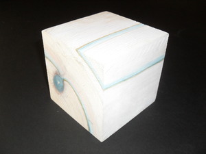 Image of Cube painted white with blue and pink embellishment DUNIH 2011.1.55