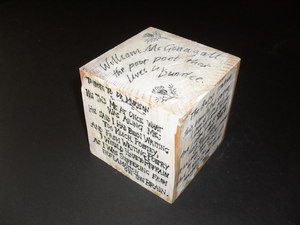 Image of Cube featuring quotes of poet William McGonagall. DUNIH 2011.1.56