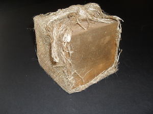 Image of Cube painted gold and wrapped in gold jute scrim. DUNIH 2011.1.70