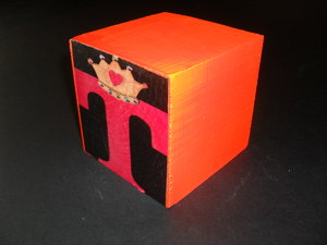Image of Cube embellished with the letter 'T' DUNIH 2011.1.80.3