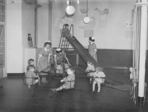 Image of Photograph of Jute Works' Nursery- Children on slides DUNIH 487.1