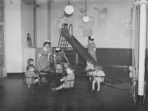 Image of Photograph of Jute Works' Nursery- Children on slides DUNIH 487.2