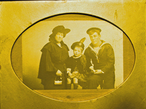 Image of Arranged portrait of sailor, woman & child. K.35