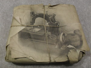 Image of Wrapped printing block of sewing machine DUNIH 284.70