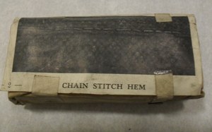 Image of Wrapped printing block of chain stitch hem DUNIH 284.97