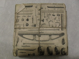 Image of Wrapped printing block of parts of a sacking or hessian machine DUNIH 284.104