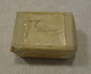 Image of Small wrapped printing block of large hemmer DUNIH 284.131