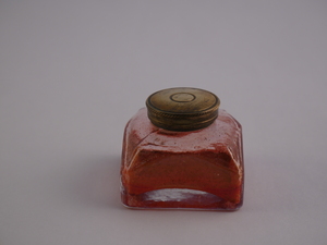 Image of Glass ink bottle part of a writing set used at Brown Street School DUNIH 2016.31.3