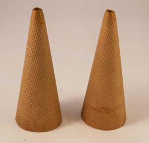 Image of Two empty yarn cone DUNIH 2010.6.17