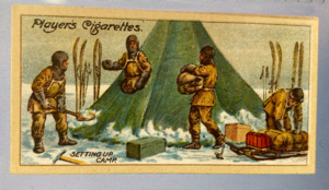 Image of CIGARETTE CARD, Second Series no.10 Unpacking Sledge and Setting up Camp, one of a collection of cigarette cards detailing Polar Exploration DUNIH 2022.18.35