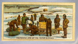 Image of CIGARETTE CARD, Second Series no.13 Preparing one of the Motor Sledges for the Southern Journey, one of a collection of cigarette cards detailing Polar Exploration DUNIH 2022.18.38